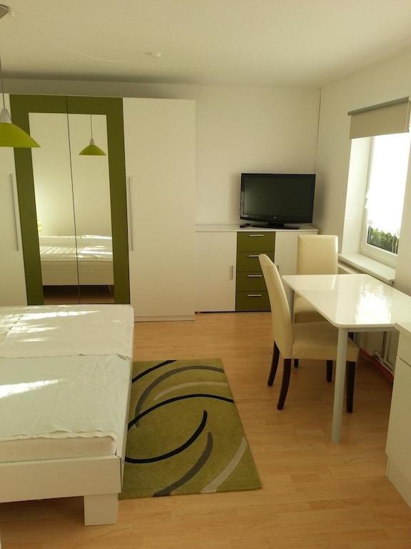 Ferienwohnanlage Brückner Apartamento Rostock Habitación foto